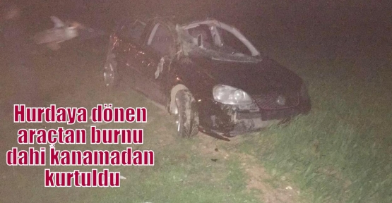 Hurdaya dönen araçtan burnu dahi kanamadan kurtuldu