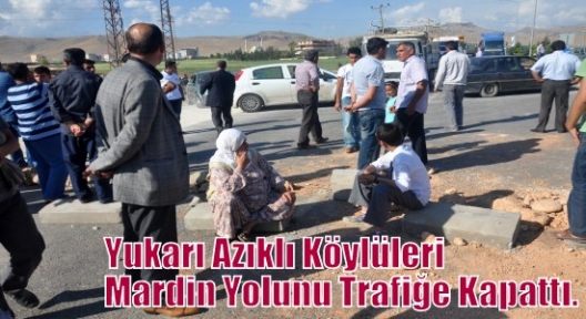 YUKARI AZIKLI KÖYLÜLERİ MARDİN YOLUNU TRAFİĞE KAPATTI. 