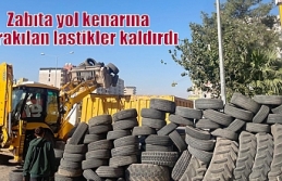 Zabıta yol kenarına bırakılan lastikler kaldırdı