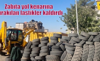 Zabıta yol kenarına bırakılan lastikler kaldırdı